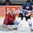 OSTRAVA, CZECH REPUBLIC - MAY 4: Finland's Joonas Kemppainen #24 tries to redirect the puck past Norway's Lars Volden #31 during preliminary round action at the 2015 IIHF Ice Hockey World Championship. (Photo by Richard Wolowicz/HHOF-IIHF Images)

